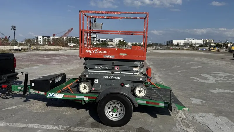 Service Rents LLC scissor lift delivery truck Central Florida